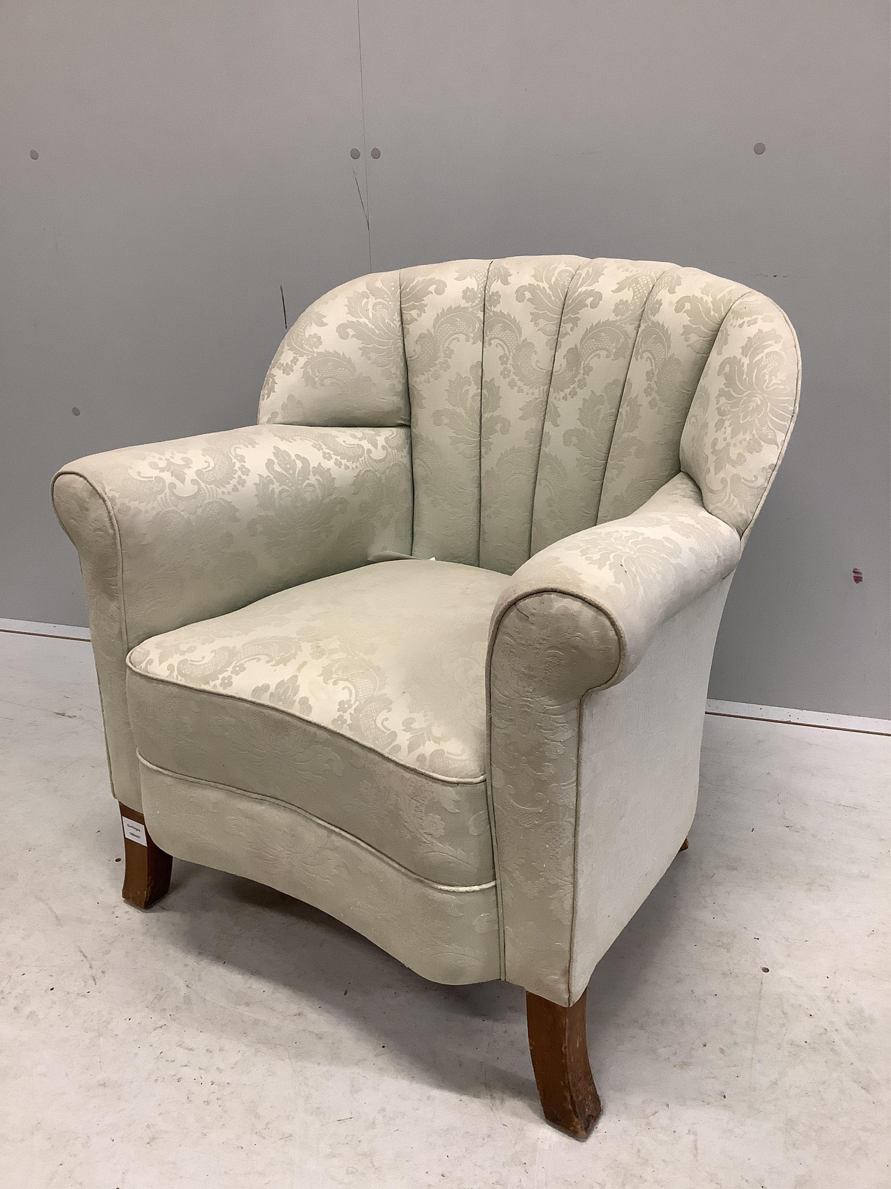 An Art Deco style upholstered tub shaped armchair, width 70cm, depth 68cm, height 76cm. Condition - fair